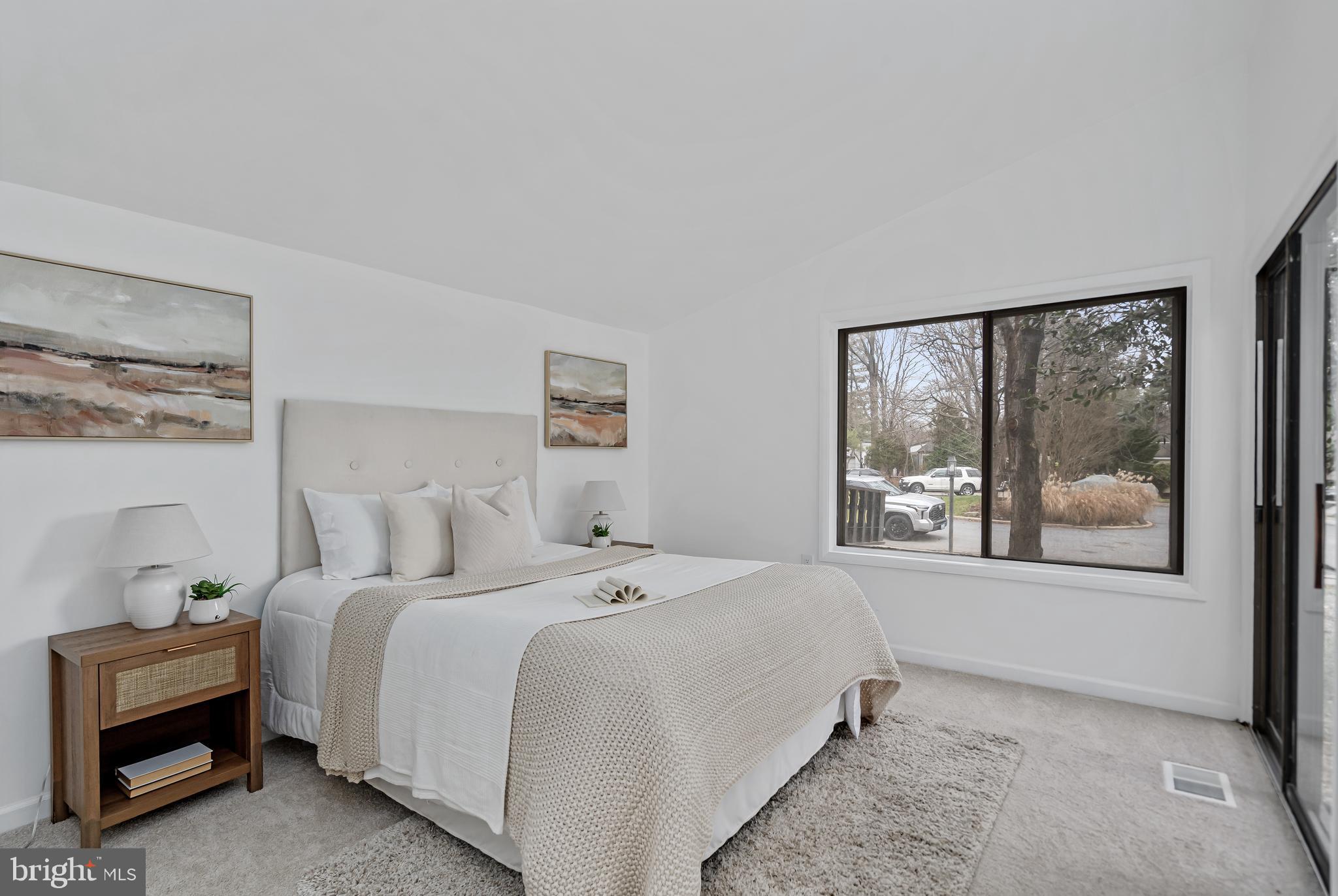 6136 Sinbad Place Columbia, MD 21045 - Photo 4 of 31 a bedroom with a bed and a window