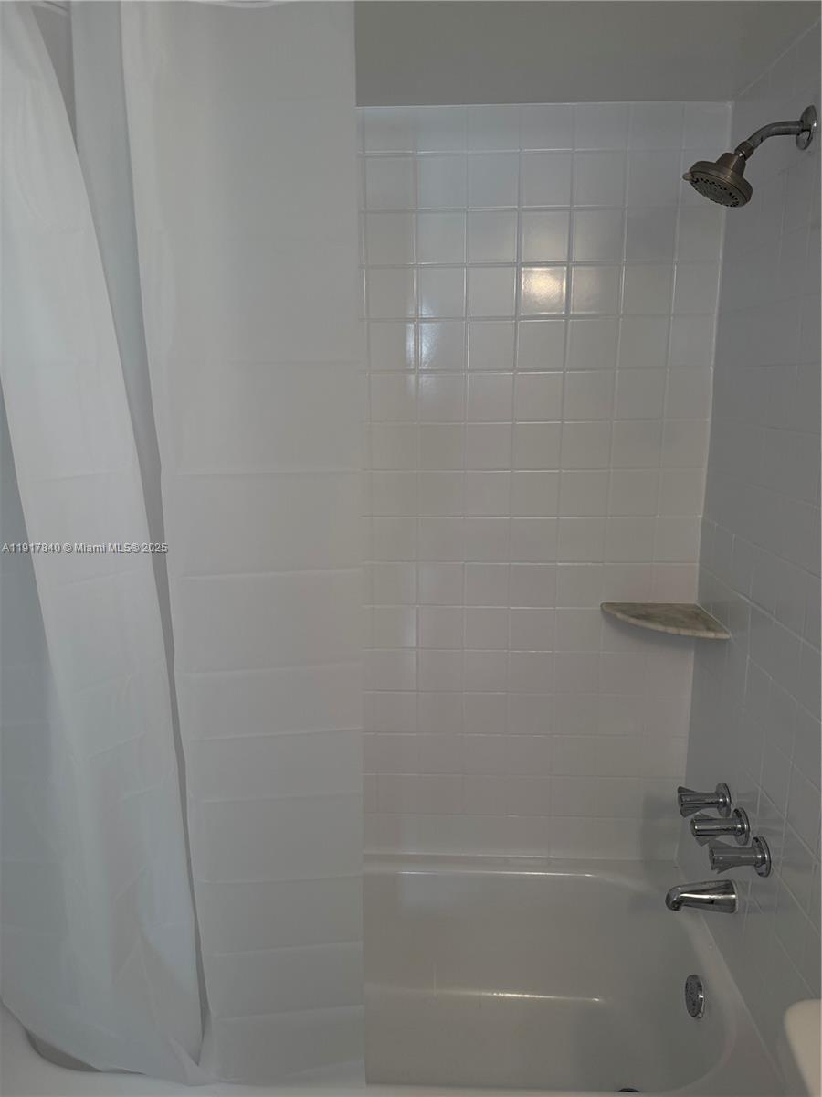 4301 Northwest 19th Street, Unit 7 Lauderhill, FL 33313 - Photo 12 of 12 a close view of a bathtub in bathroom