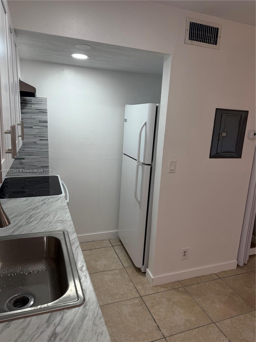 4301 Northwest 19th Street, Unit 7 Lauderhill, FL 33313 - Photo 5 of 12 a view of utility room