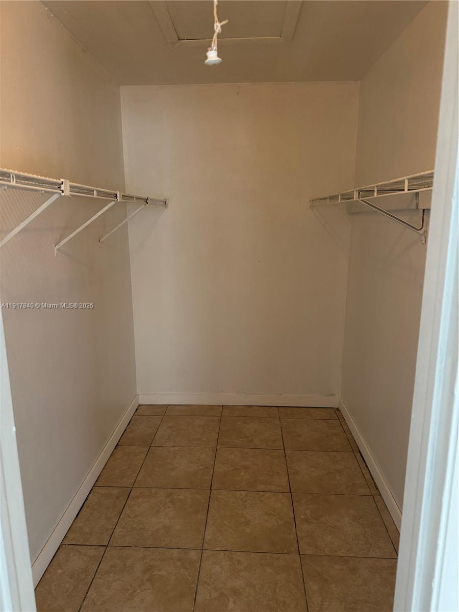 4301 Northwest 19th Street, Unit 7 Lauderhill, FL 33313 - Photo 9 of 12 a view of a room with white walls