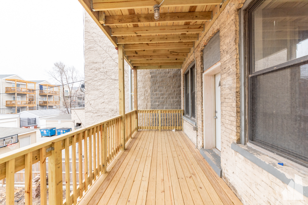 1420 West Irving Park Road, Unit 3 Chicago, IL 60613 - Photo 21 of 21 a view of balcony with a window