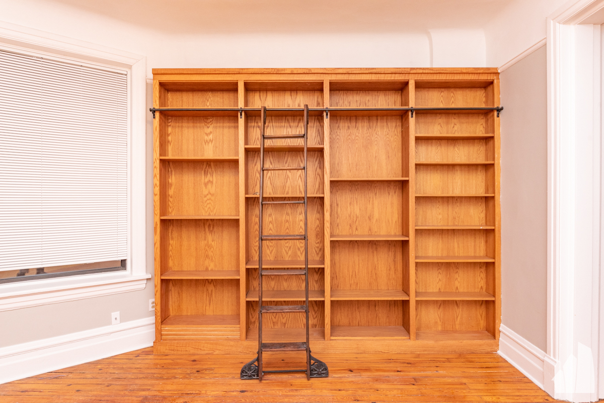 1420 West Irving Park Road, Unit 3 Chicago, IL 60613 - Photo 7 of 21 a view of a room with shelves on the wall