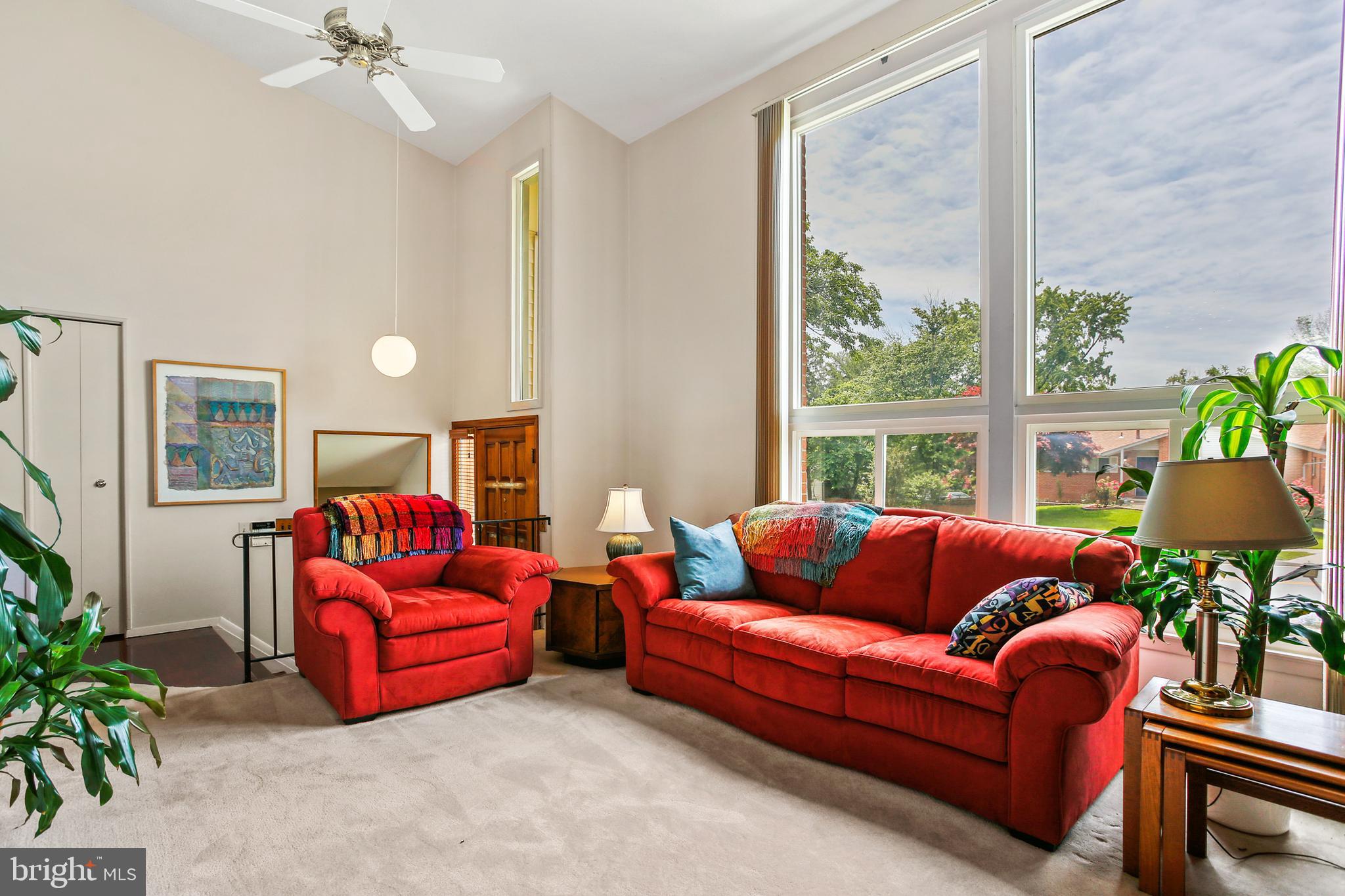 Bright Living Room w/ 2-story Foyer