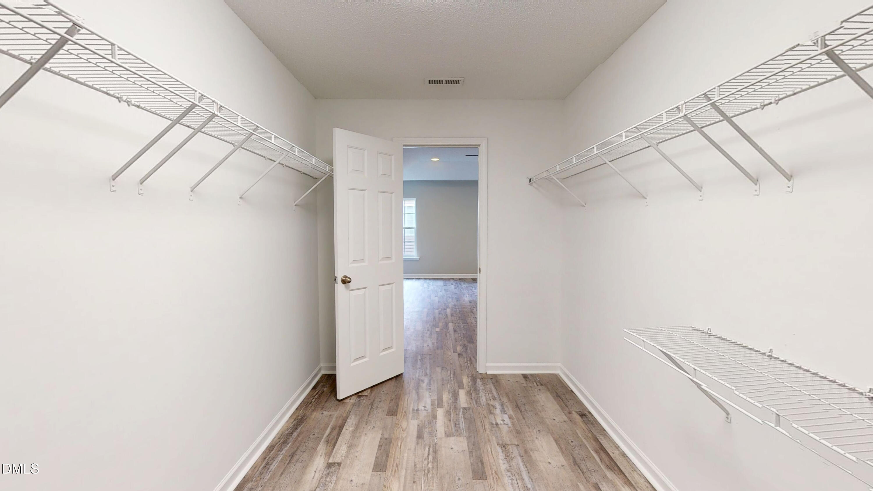5708 Sea Fox Court Raleigh, NC 27616 - Photo 28 of 50 a view of a room with racks on the wall