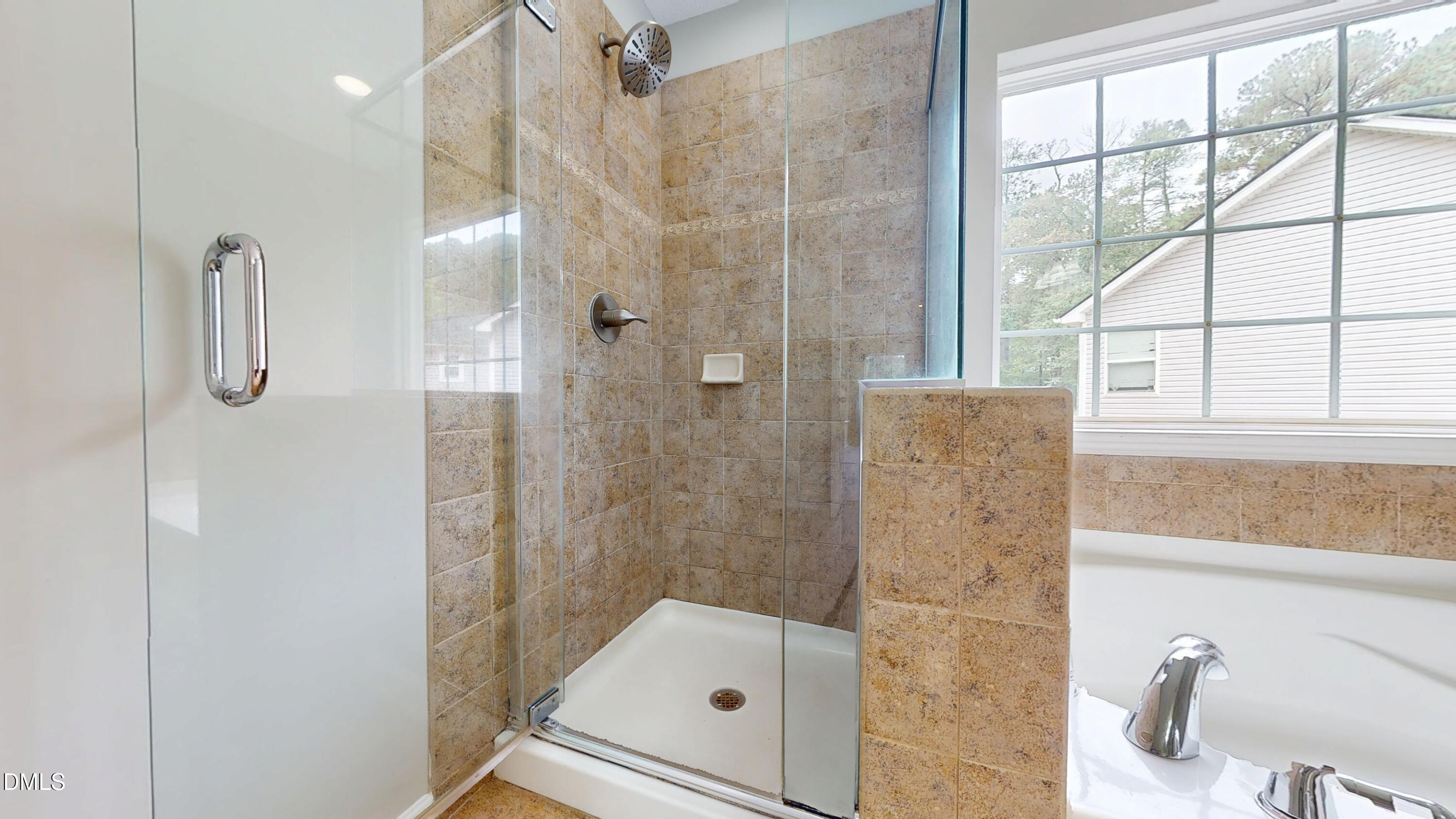 5708 Sea Fox Court Raleigh, NC 27616 - Photo 31 of 50 a bathroom with a shower