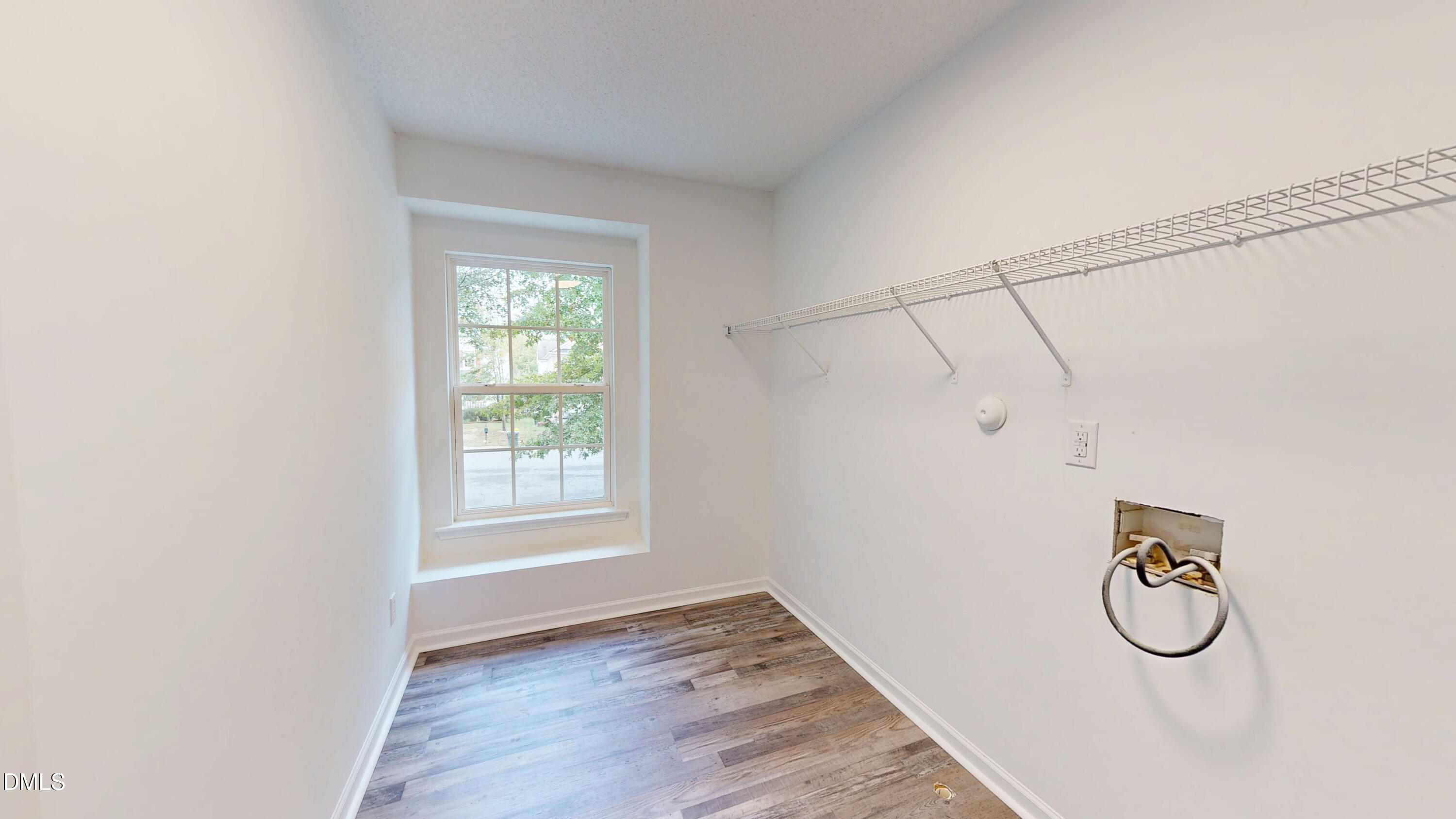 5708 Sea Fox Court Raleigh, NC 27616 - Photo 37 of 50 a view of a storage & utility room with a window