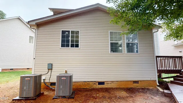 a view of a street with a house