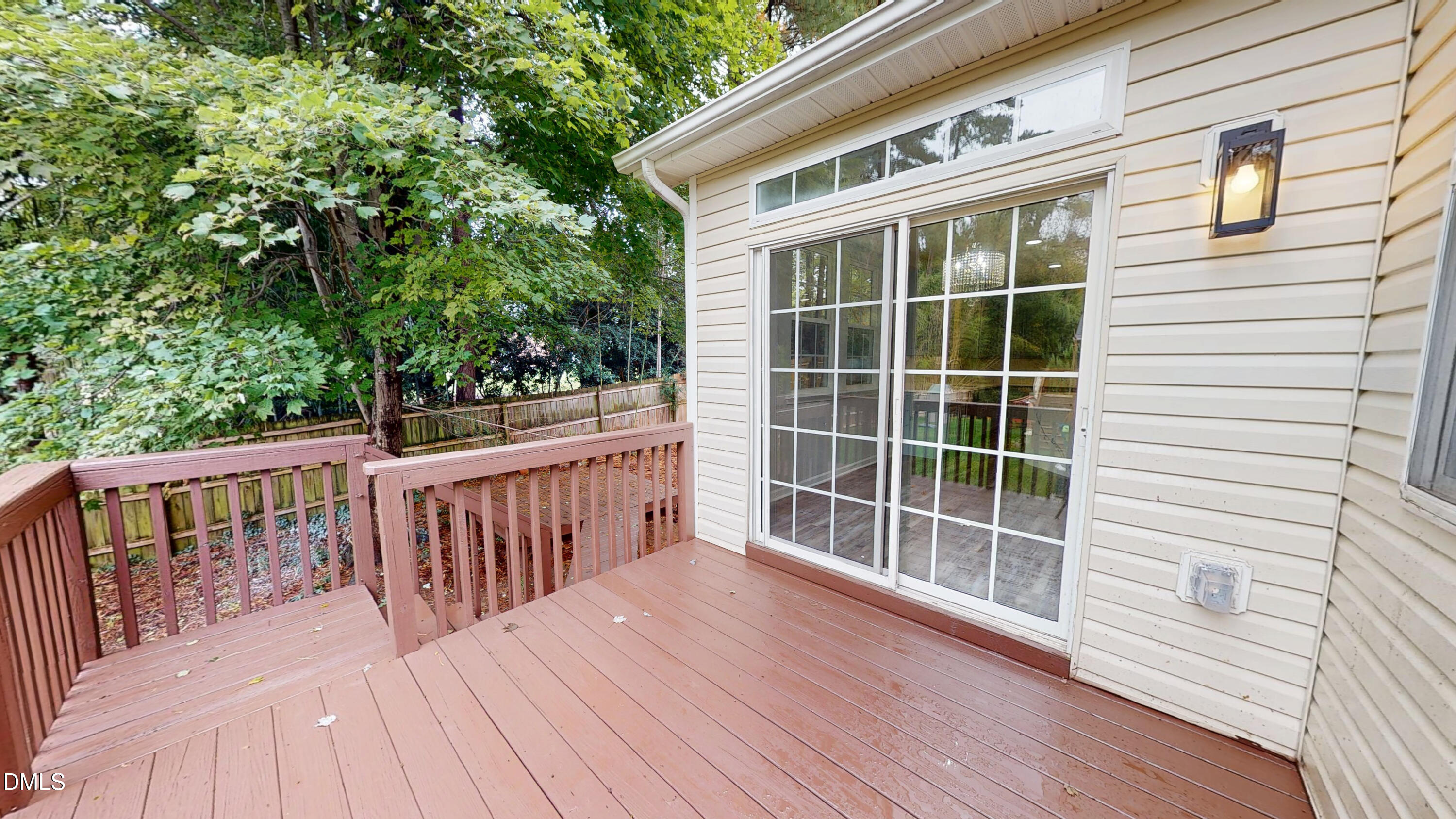 5708 Sea Fox Court Raleigh, NC 27616 - Photo 47 of 50 a view of a deck with wooden floor and fence