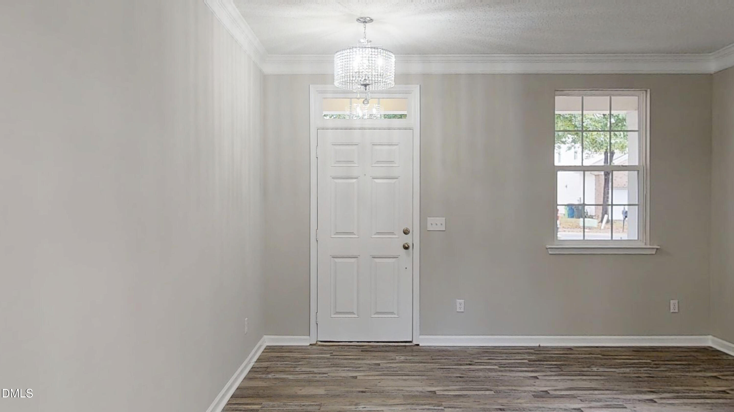 5708 Sea Fox Court Raleigh, NC 27616 - Photo 4 of 50 wooden floor in an empty room with a window