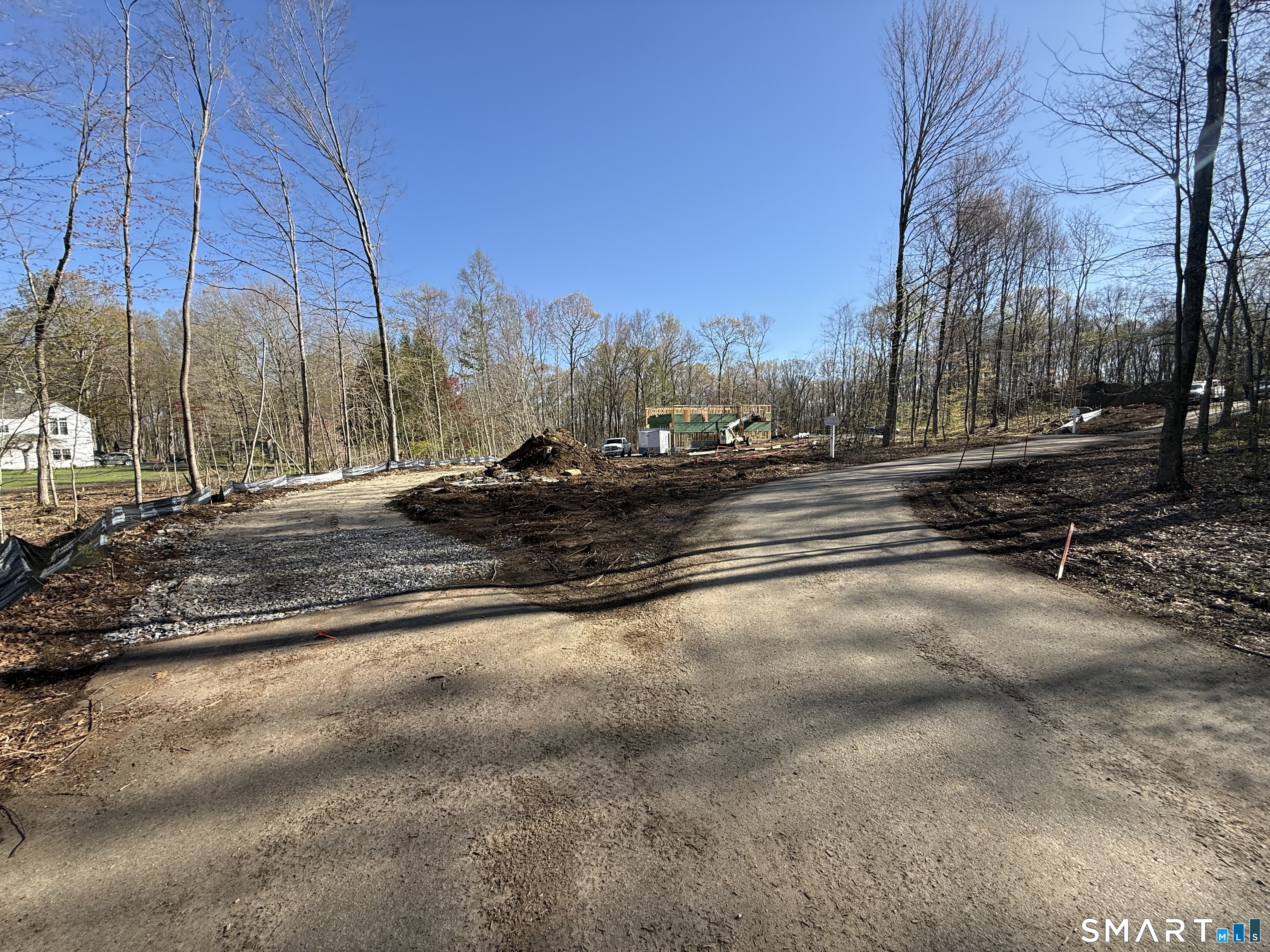 94 Quail Run Road Woodbury, CT 06798 - Photo 11 of 26 The left fork is the driveway to #94
