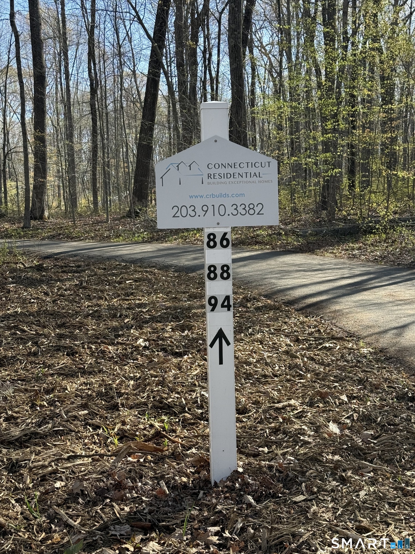 94 Quail Run Road Woodbury, CT 06798 - Photo 10 of 26 On the way into the shared driveway