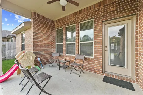 a house view with a backyard space
