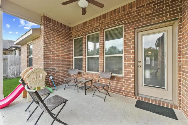 a house view with a backyard space