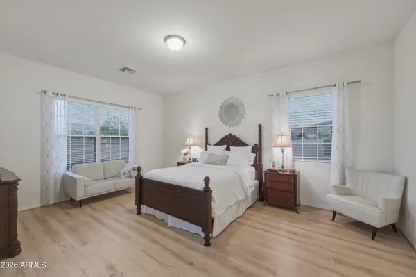 a bed room with a bed and a couch