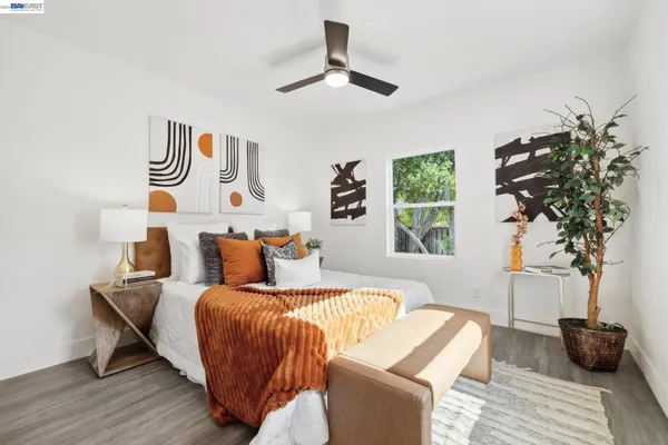 a bedroom with furniture and a window