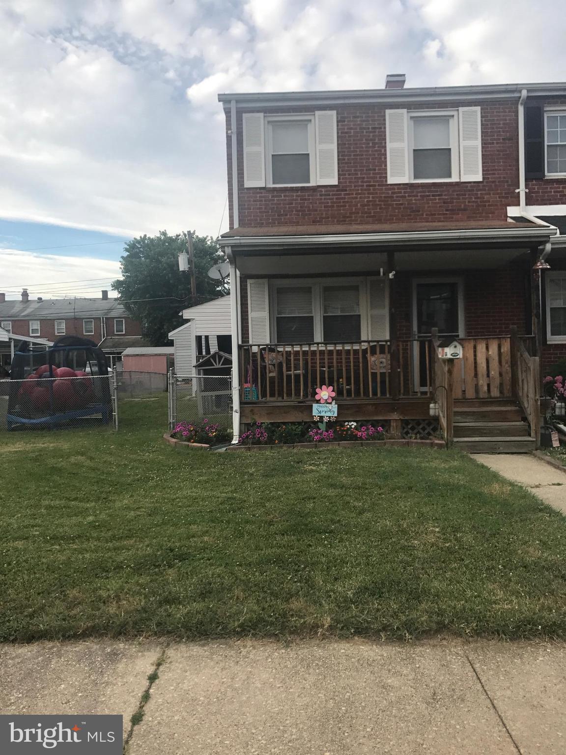 8180 Del Haven Road Baltimore, MD 21222 - Photo 1 of 29 a view of a house with a yard and sitting area