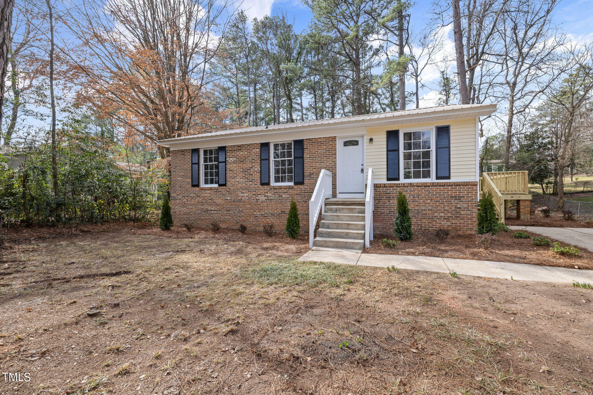 608 Old Farm Road Raleigh, NC 27606 - Photo 2 of 32 a view of a house with a yard and large tree