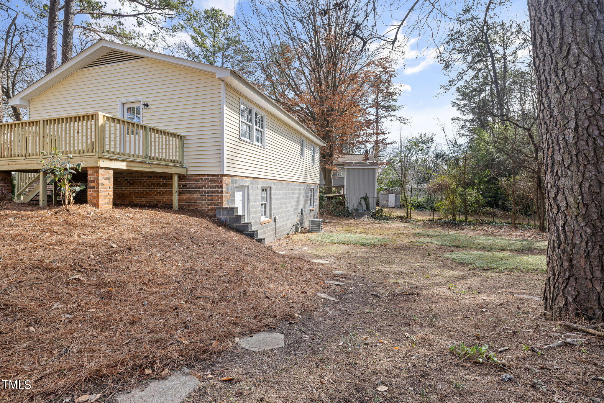 608 Old Farm Road Raleigh, NC 27606 - Photo 29 of 32 a view of a house with a yard