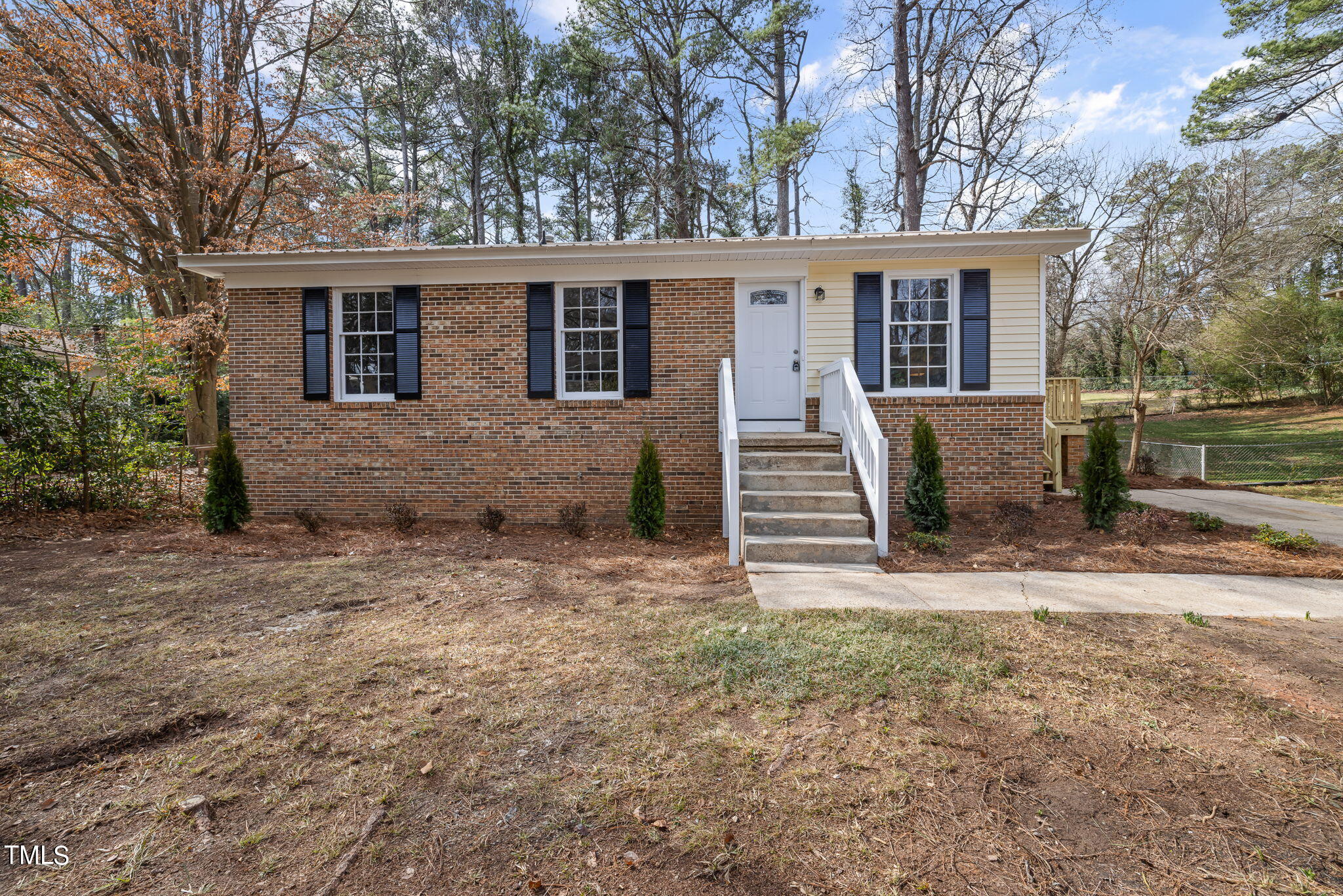608 Old Farm Road Raleigh, NC 27606 - Photo 3 of 32 front view of a house with a yard