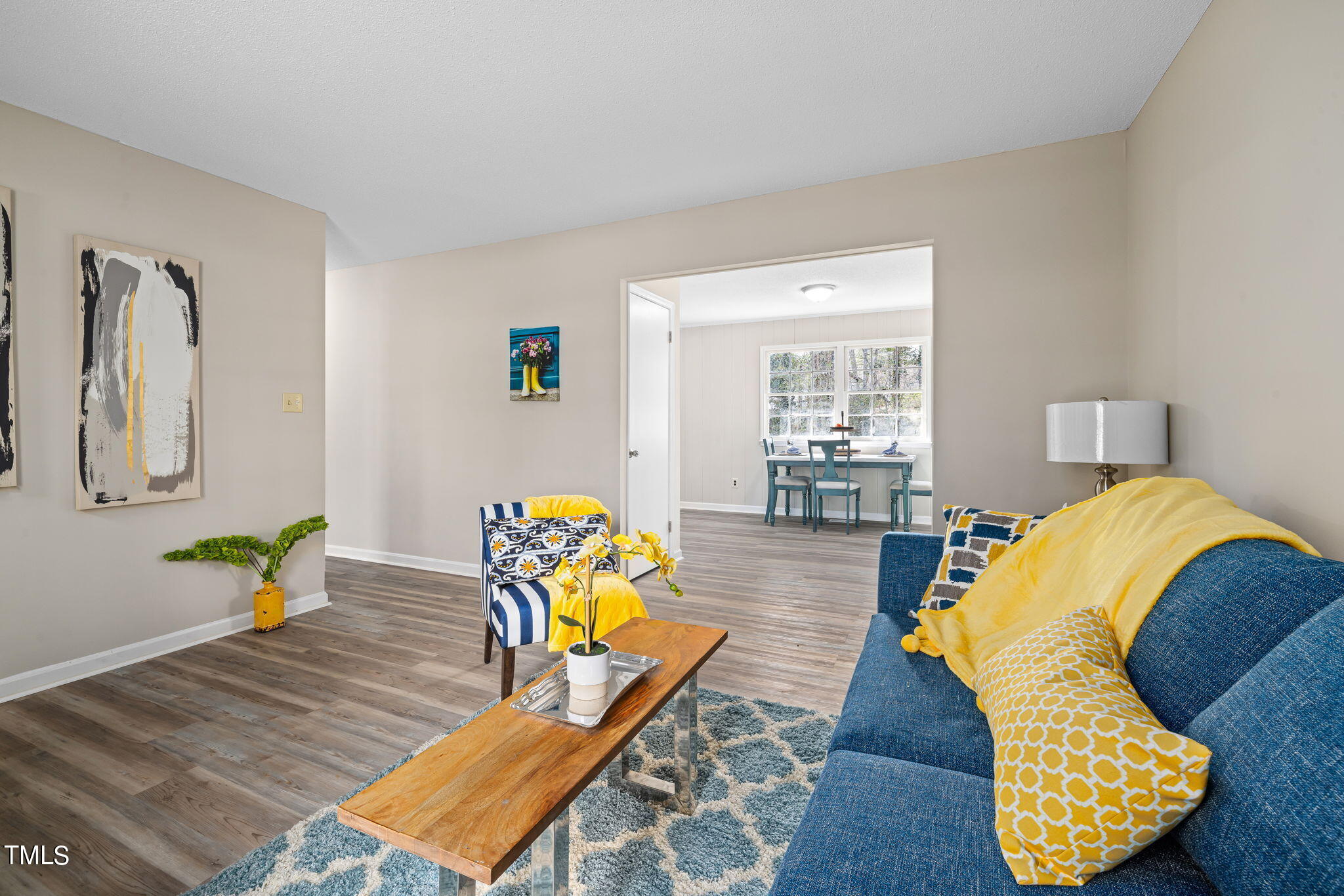 608 Old Farm Road Raleigh, NC 27606 - Photo 10 of 32 a living room with furniture and wooden floor