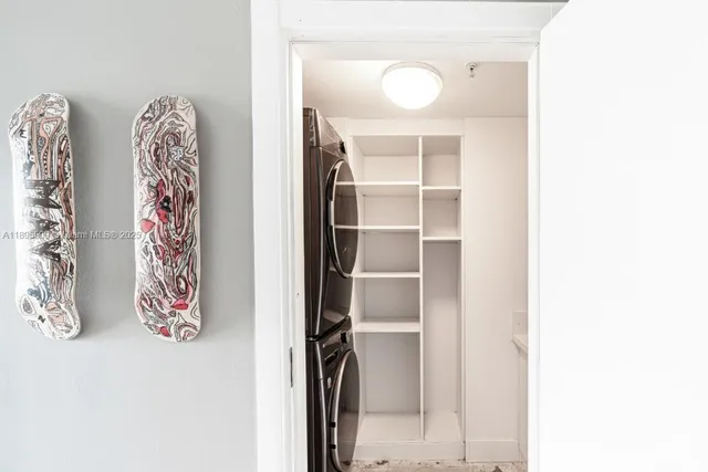 a view of a hallway with closet
