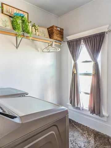 a room with a bed and a window