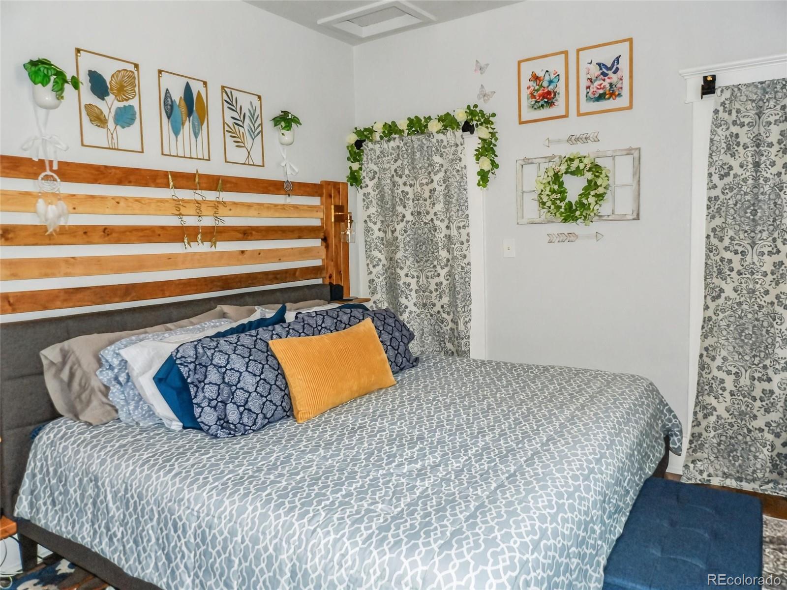 7651 State Highway Las Animas, CO 81054 - Photo 16 of 25 a bedroom with a bed and a couch