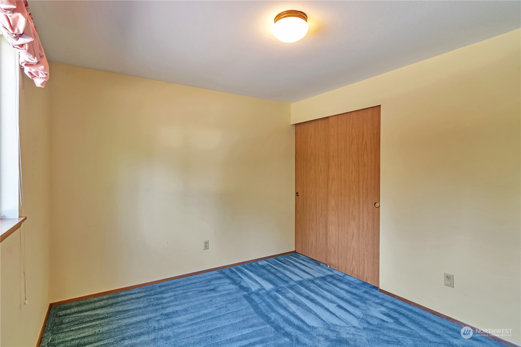 18330 26th Drive Southeast Bothell, WA 98012 - Photo 18 of 24 a view of an empty room with wooden floor