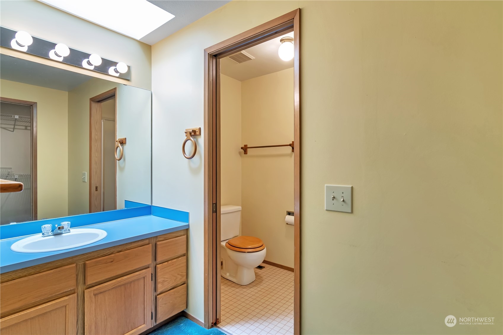18330 26th Drive Southeast Bothell, WA 98012 - Photo 21 of 24 a bathroom with a sink a toilet and shower