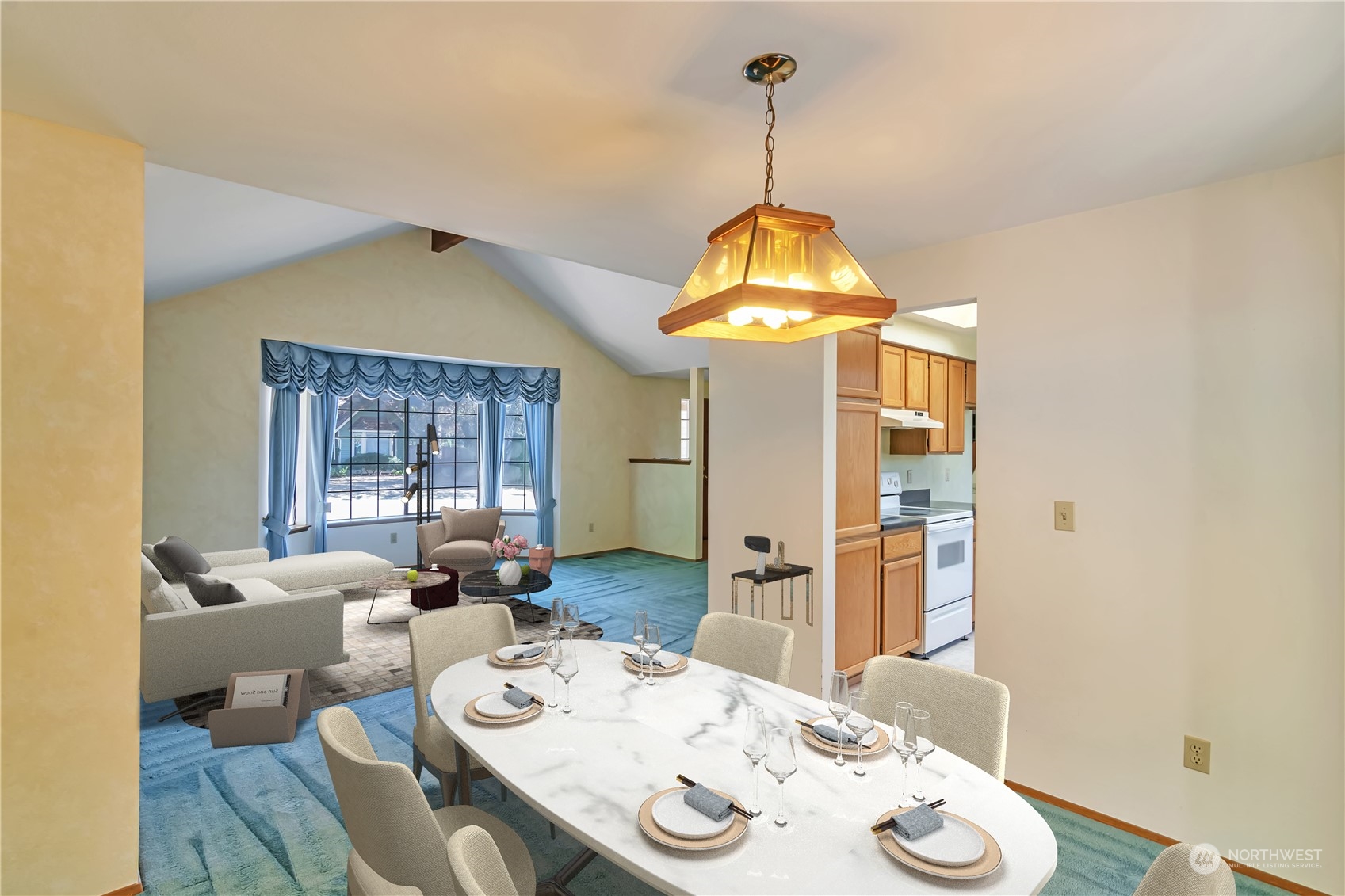18330 26th Drive Southeast Bothell, WA 98012 - Photo 5 of 24 a view of a dining room and livingroom with furniture wooden floor a chandelier