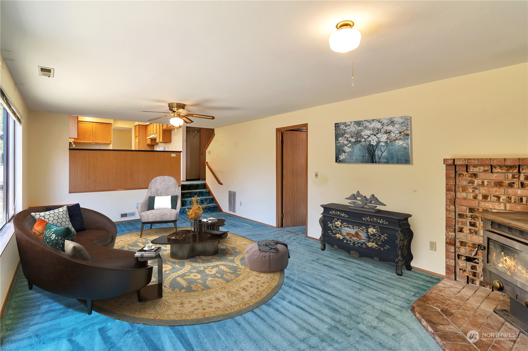 18330 26th Drive Southeast Bothell, WA 98012 - Photo 10 of 24 a living room with furniture and a wooden floor