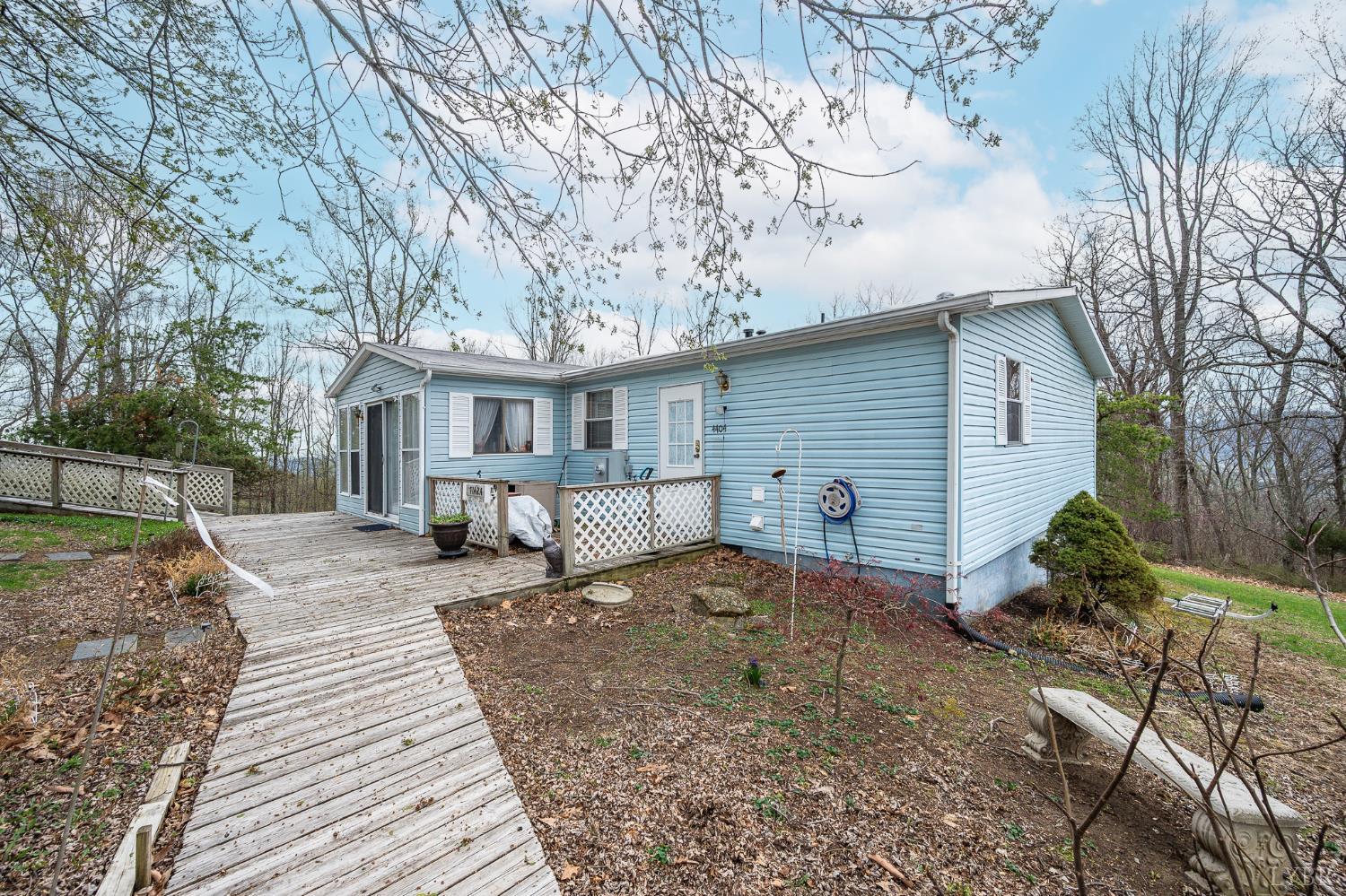 4400 Murray Hollow Road Thaxton, VA 24174 - Photo 27 of 56 a view of a house with backyard and sitting area