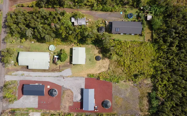 an aerial view of residential house with outdoor space