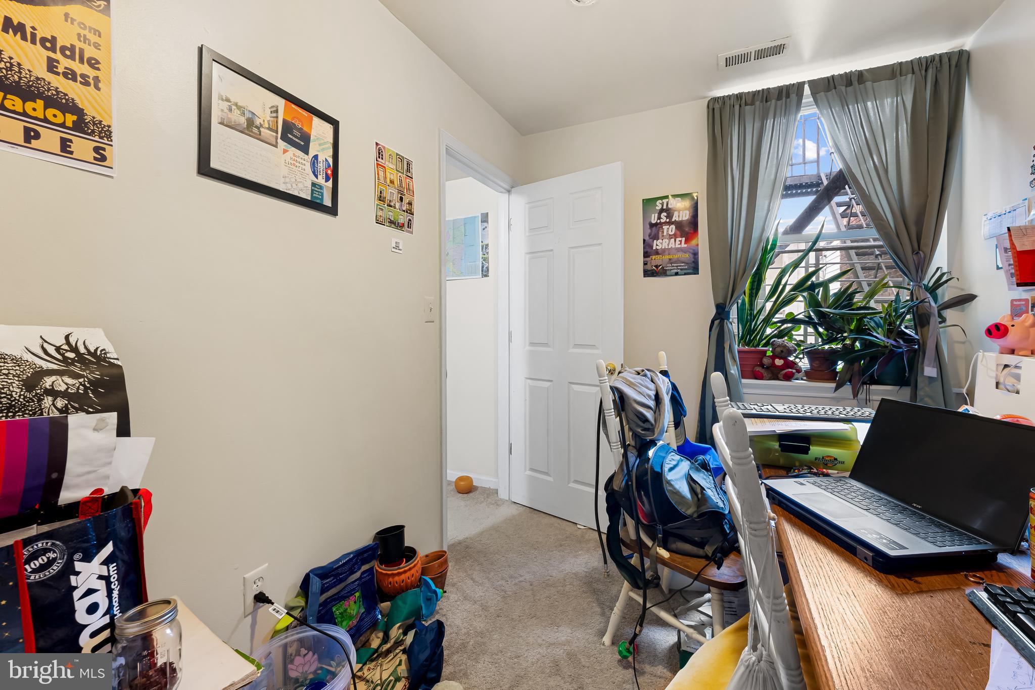 906 Whitelock Street Baltimore, MD 21217 - Photo 27 of 36 a view of a workspace with furniture and toys