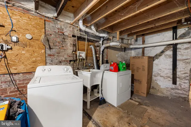 a utility room with dryer and washer