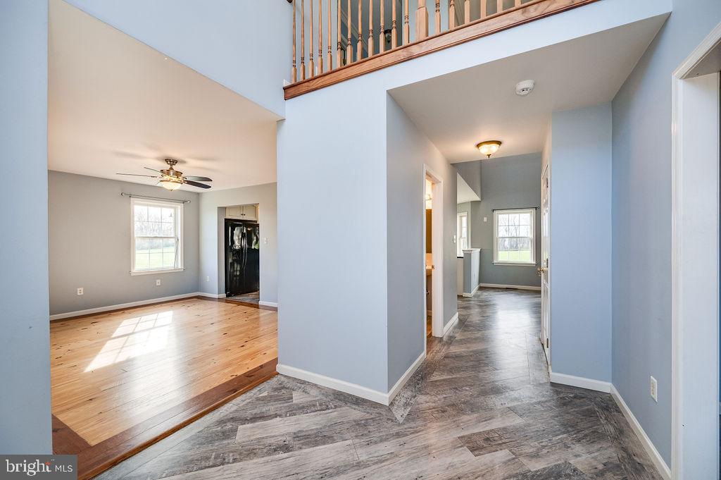 130 Troxel Road Shoemakersville, PA 19555 - Photo 12 of 100 a view of a hallway with wooden floor and a living room