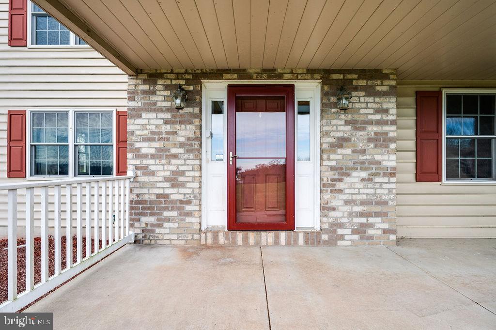 130 Troxel Road Shoemakersville, PA 19555 - Photo 8 of 100 a front view of a house with a garage