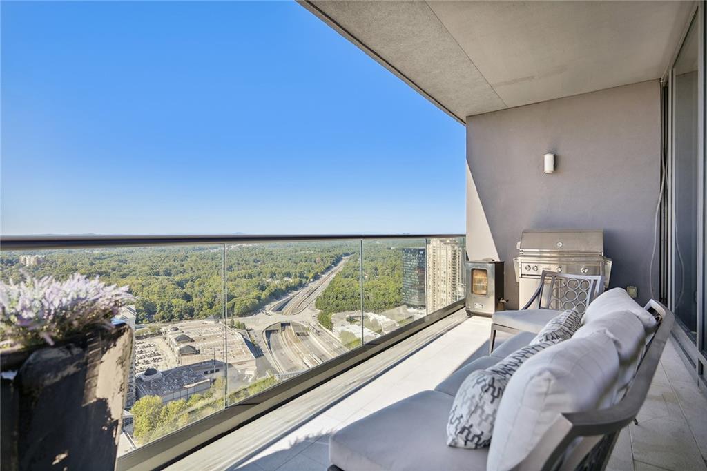 3344 Peachtree Road Northeast, Unit 3202 Atlanta, GA 30326 - Photo 16 of 39 a view of a large window with chairs
