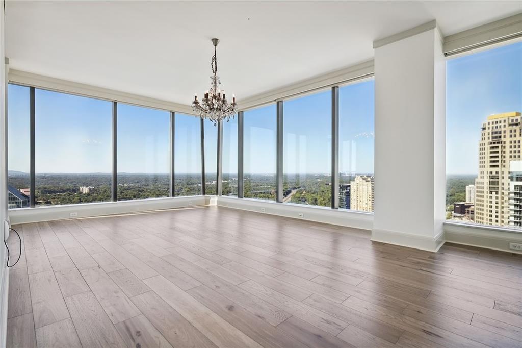 3344 Peachtree Road Northeast, Unit 3202 Atlanta, GA 30326 - Photo 25 of 39 a view of room with window and wooden floor