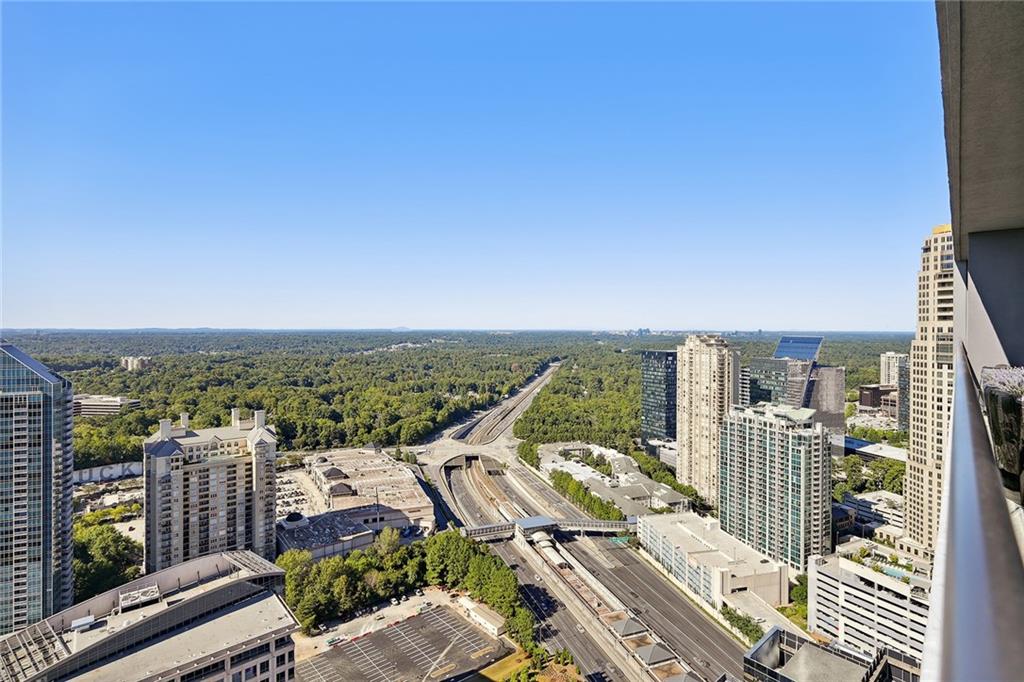 3344 Peachtree Road Northeast, Unit 3202 Atlanta, GA 30326 - Photo 8 of 39 a view of a balcony with city view