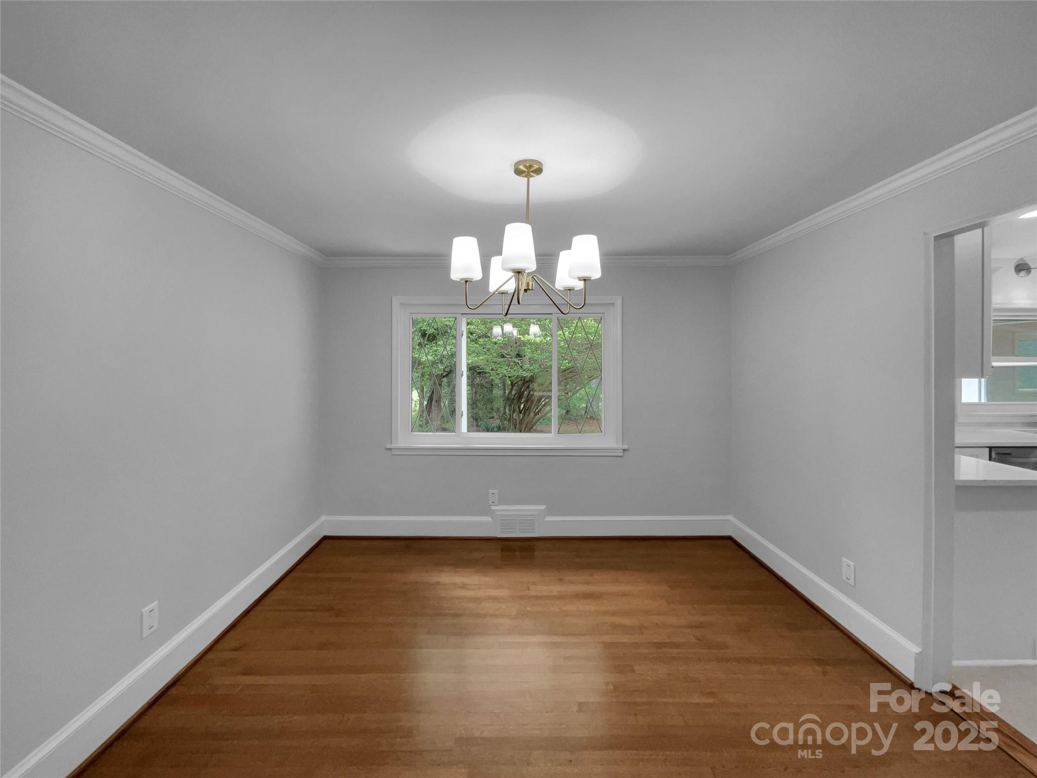141 Edenvale Road Rock Hill, SC 29730 - Photo 11 of 27 wooden floor in an empty room with a window
