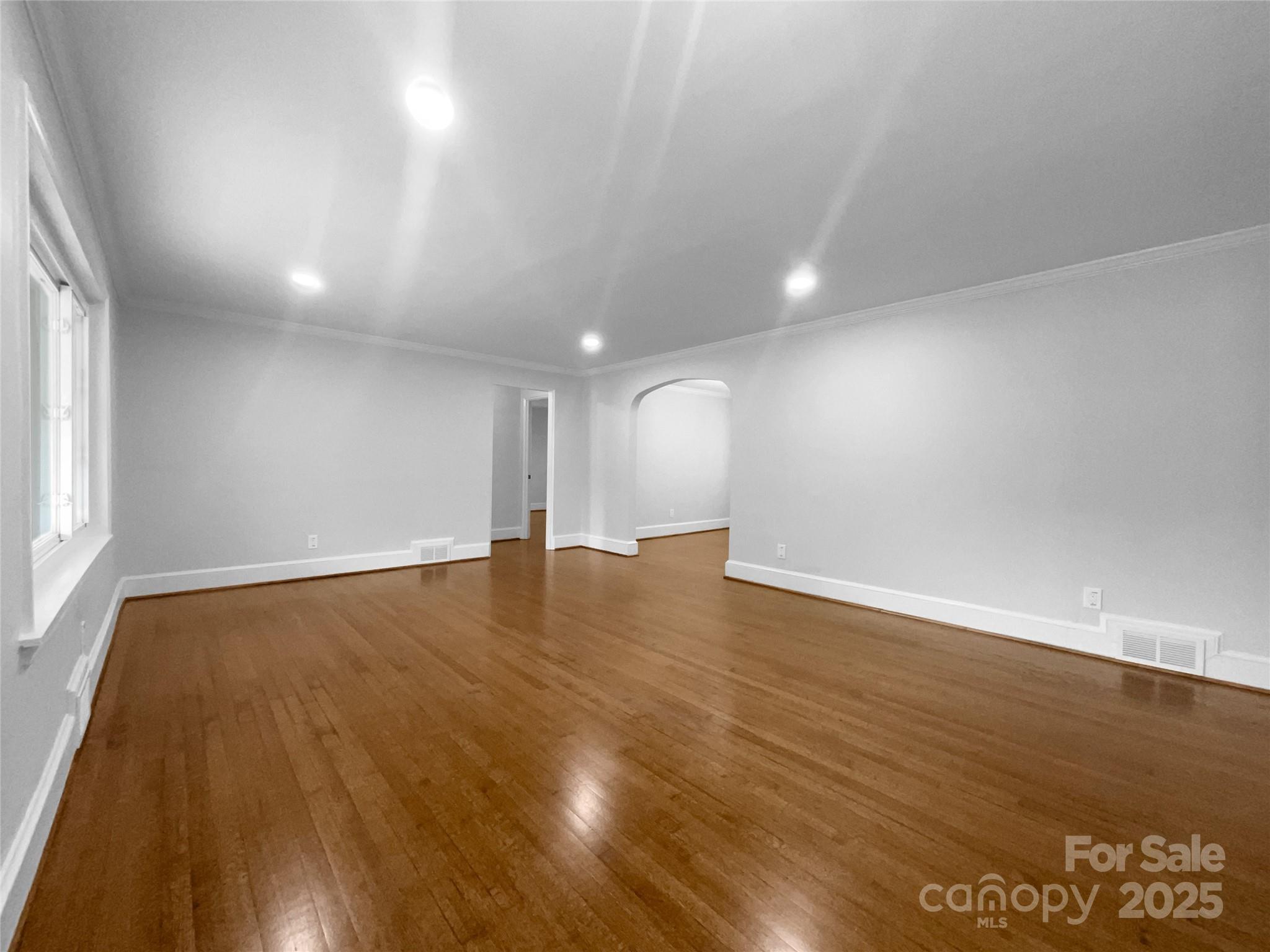 141 Edenvale Road Rock Hill, SC 29730 - Photo 3 of 27 a view of an empty room with wooden floor