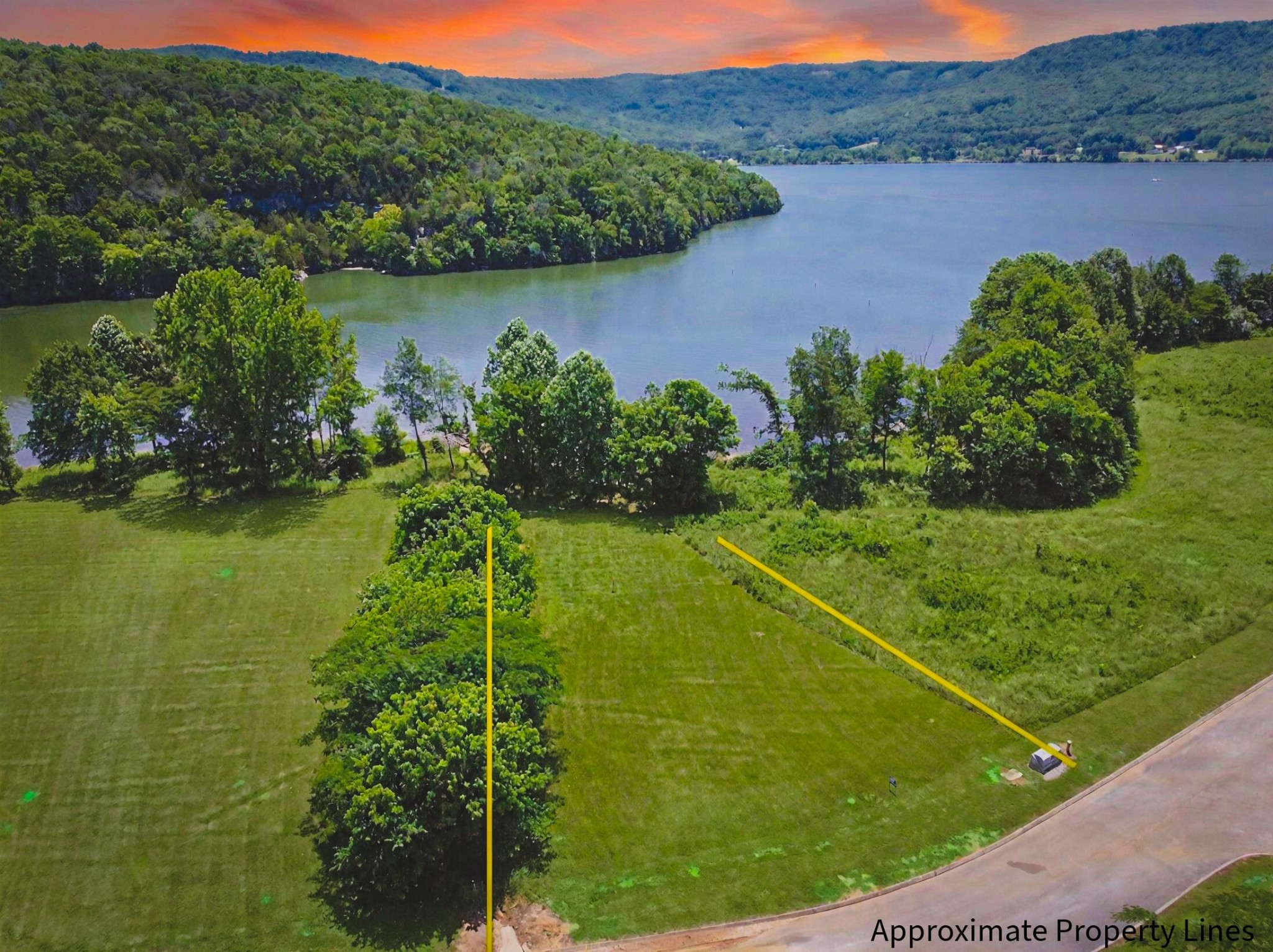 0 Edgewater Way Jasper, TN 37347 - Photo 7 of 22 a view of a lake with a yard