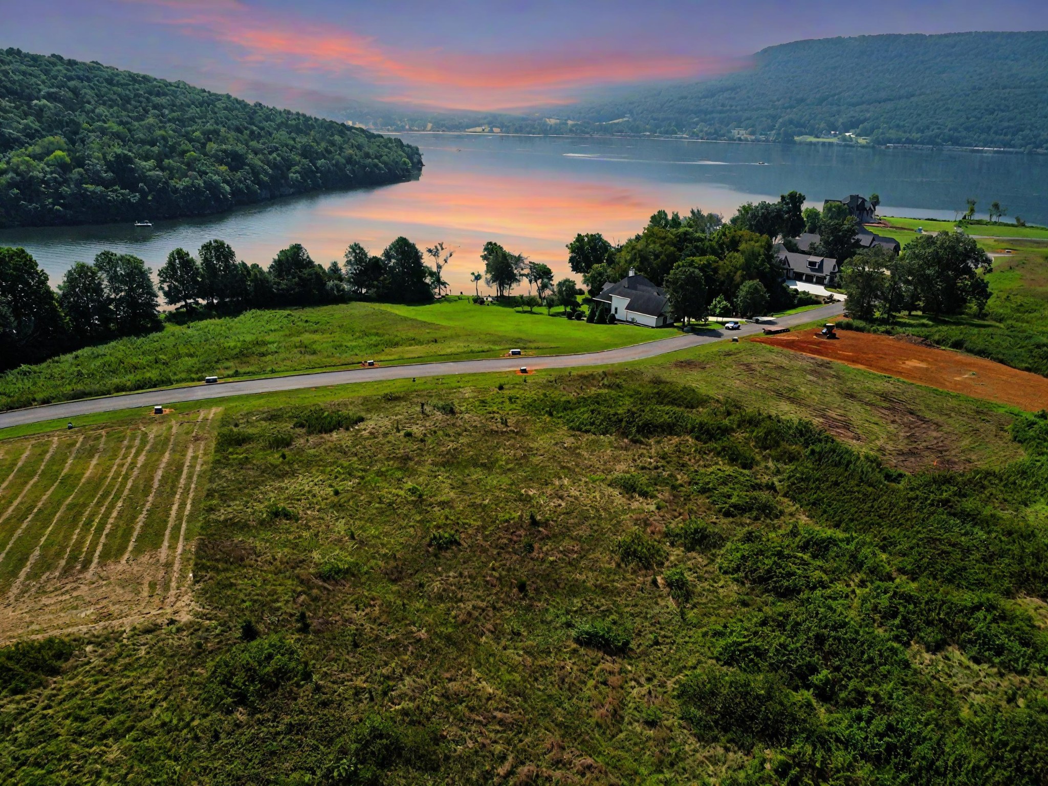 0 Edgewater Way Jasper, TN 37347 - Photo 8 of 22 a view of a golf course with a lake