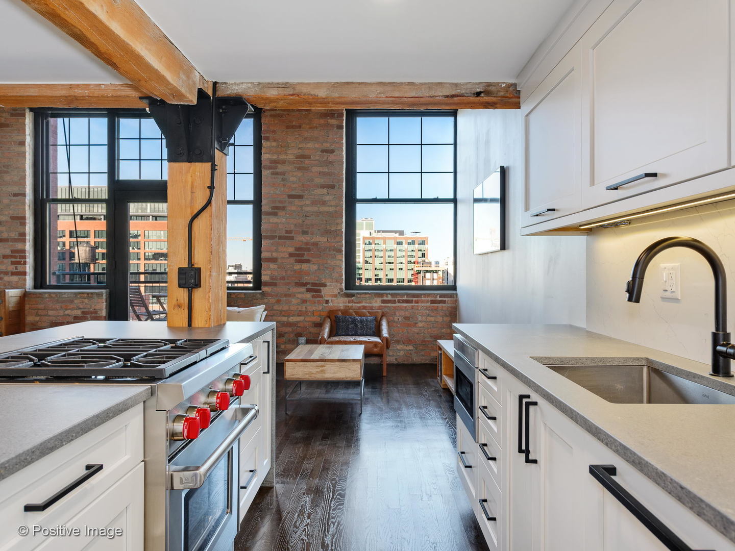 1000 West Washington Boulevard, Unit 540 Chicago, IL 60607 - Photo 11 of 28 a kitchen that has a sink and a stove