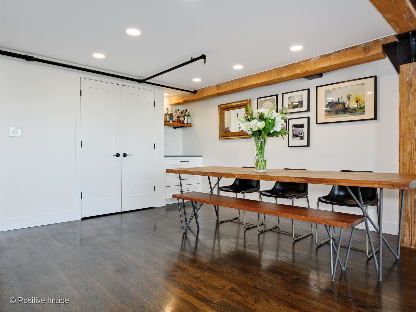 1000 West Washington Boulevard, Unit 540 Chicago, IL 60607 - Photo 13 of 28 a view of a dining room with furniture and wooden floor