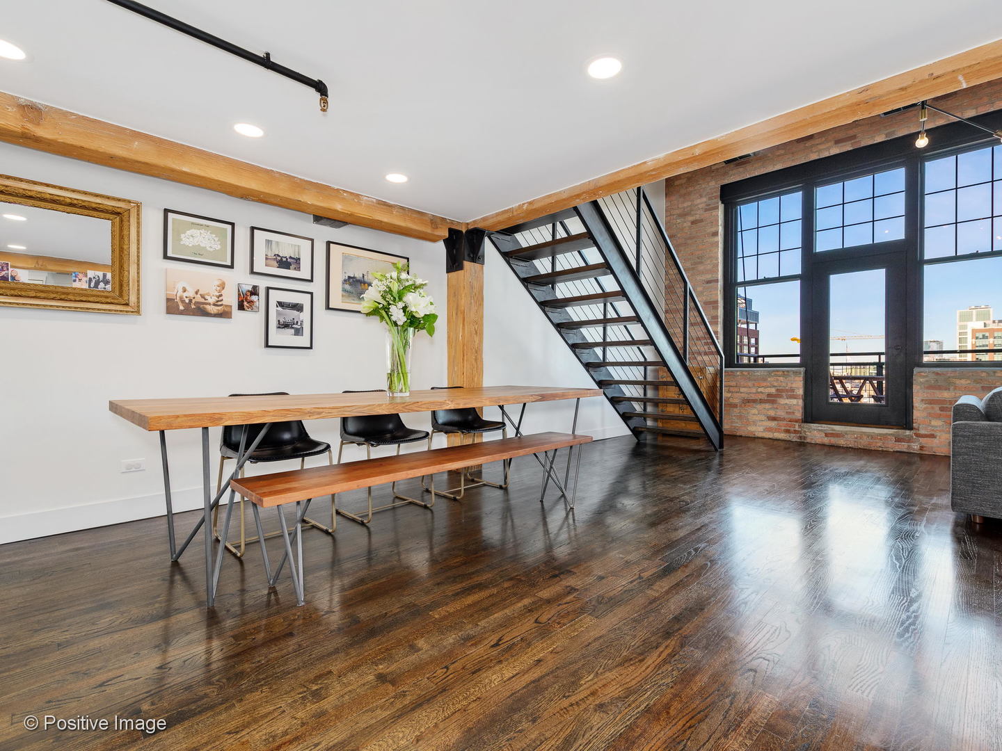 1000 West Washington Boulevard, Unit 540 Chicago, IL 60607 - Photo 14 of 28 a view of a dining room with furniture window and wooden floor