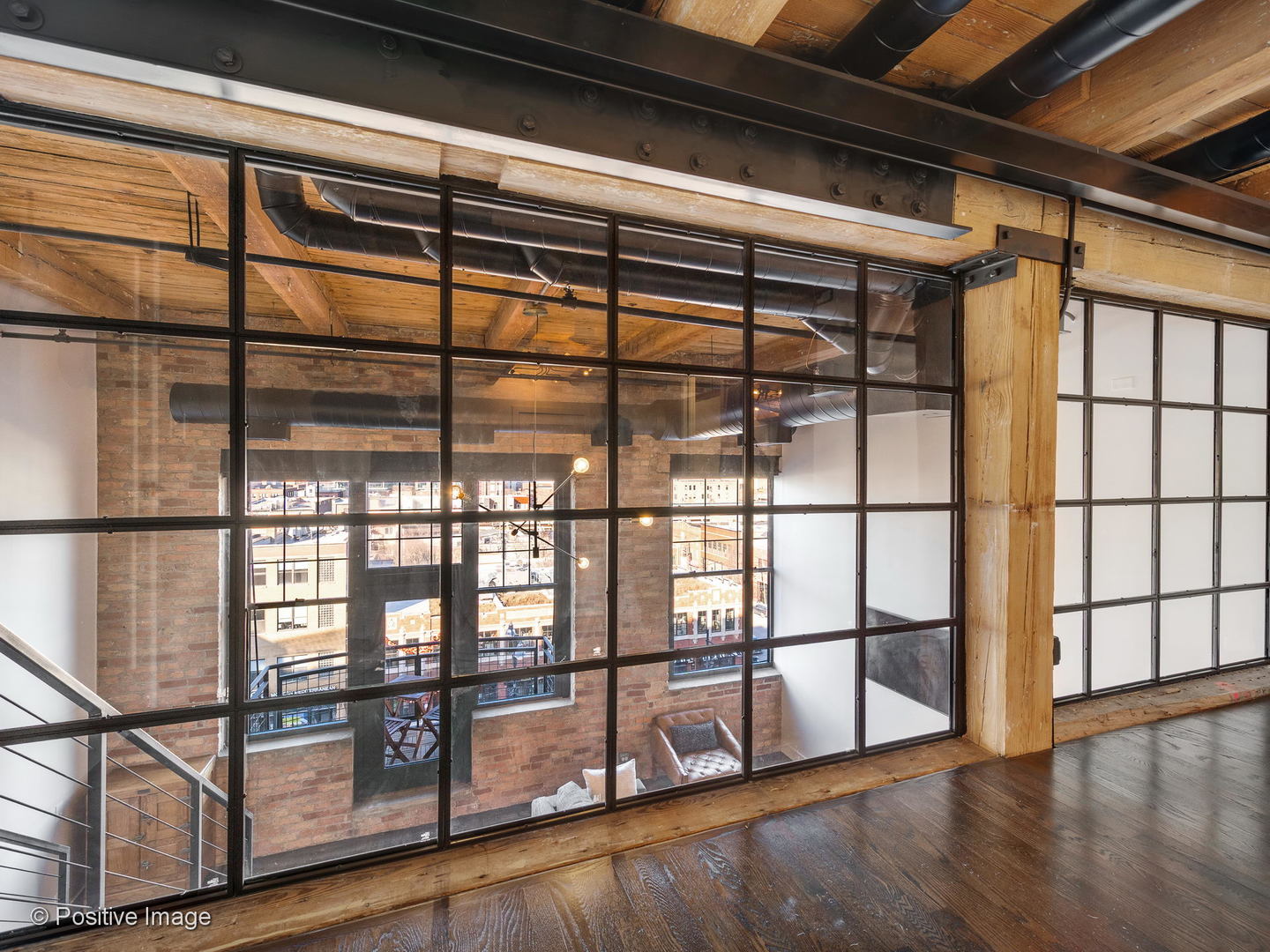 1000 West Washington Boulevard, Unit 540 Chicago, IL 60607 - Photo 17 of 28 a view of front door with staircase