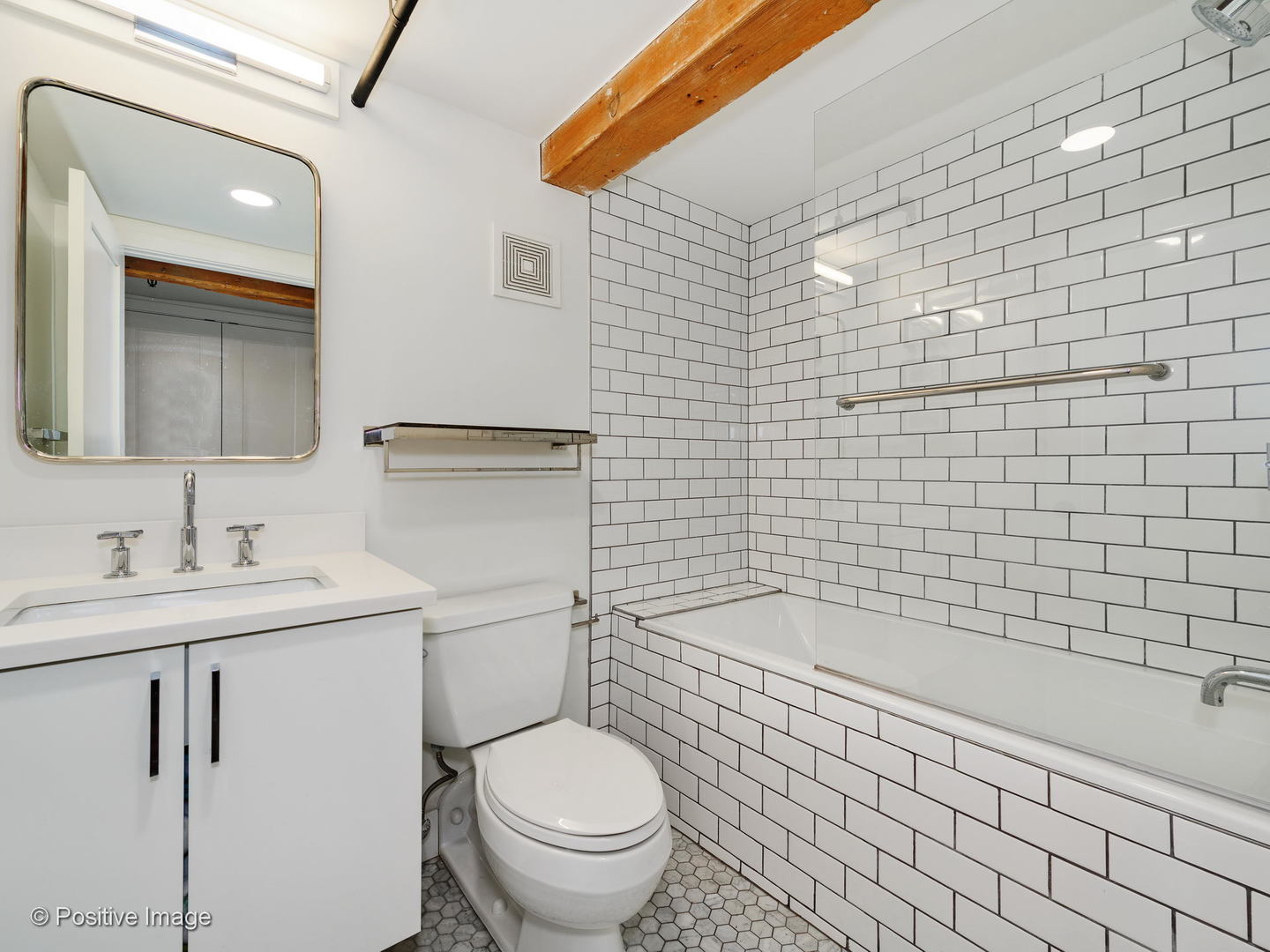 1000 West Washington Boulevard, Unit 540 Chicago, IL 60607 - Photo 20 of 28 a bathroom with a sink a toilet and shower