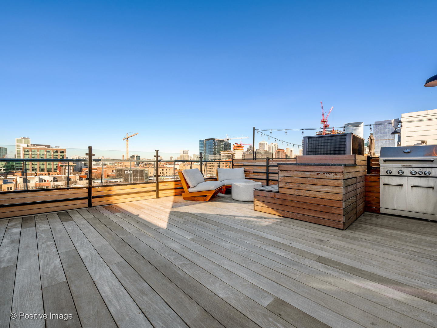 1000 West Washington Boulevard, Unit 540 Chicago, IL 60607 - Photo 25 of 28 a view of a terrace with wooden floor and seating space